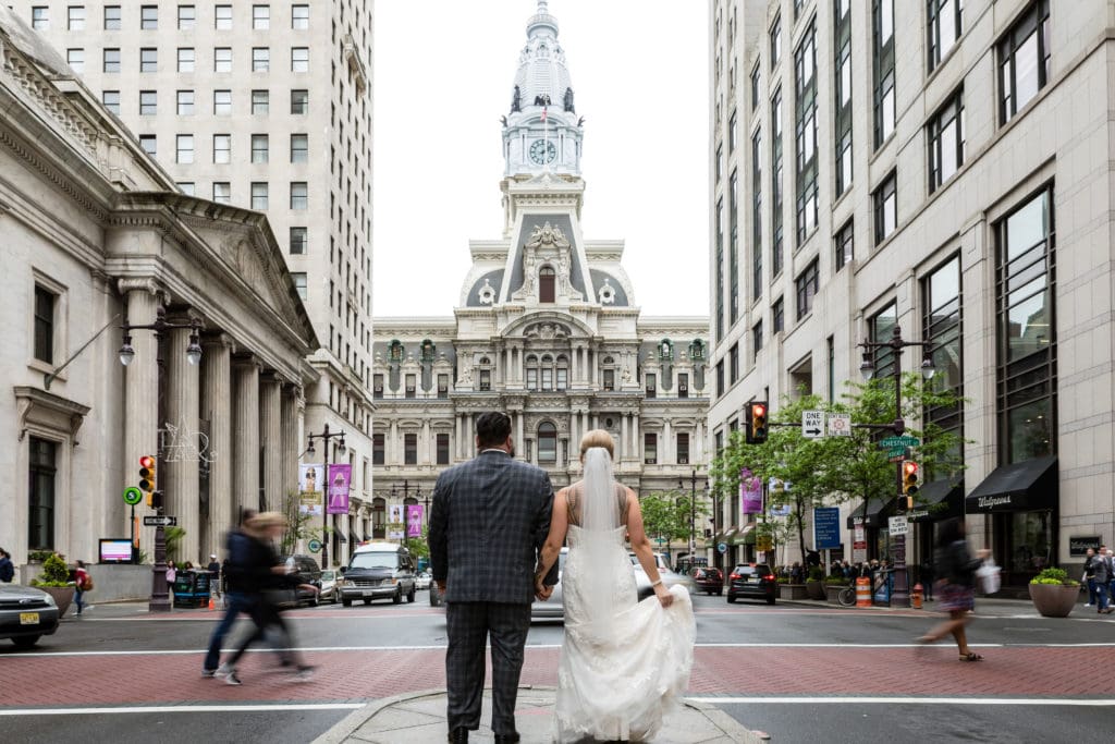 couple on the way to philadelphia city hall to sign a self-uniting marriage license, civil marriage ceremony, city hall wedding