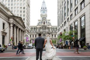 couple on the way to philadelphia city hall to sign a self-uniting marriage license, civil marriage ceremony, city hall wedding
