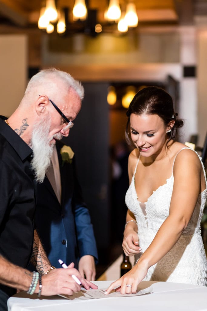 family member signing as witness on a couple's self-uniting marriage license