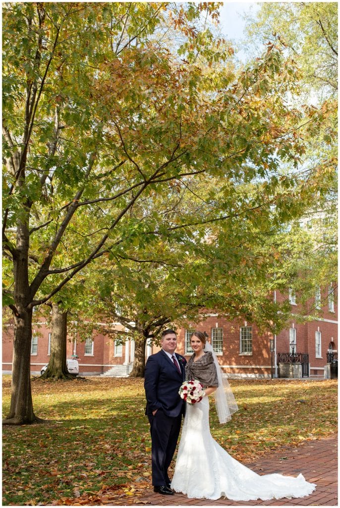 Traditional bride and groom portrait in park in Old City Philadelphia