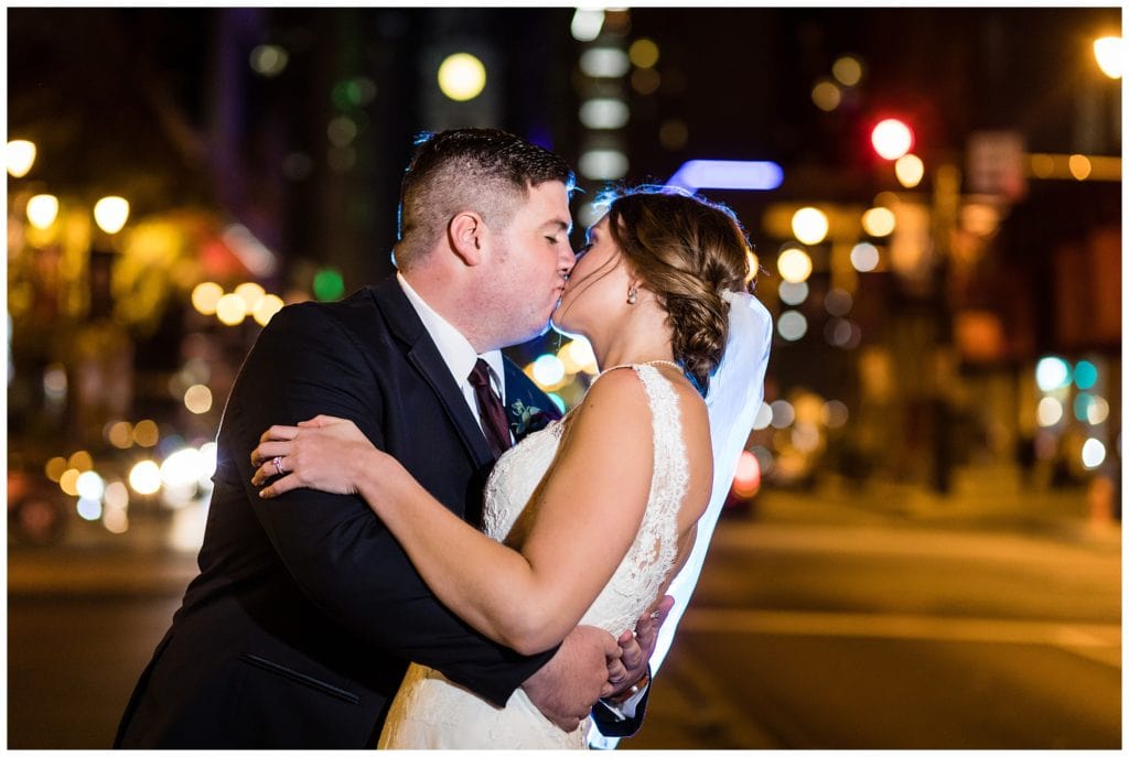 Bride and groom city night portrait in Philadelphia