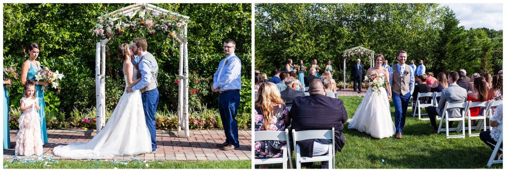 Bride and groom kiss and walk up aisle at outdoor Barn on Bridge wedding ceremony