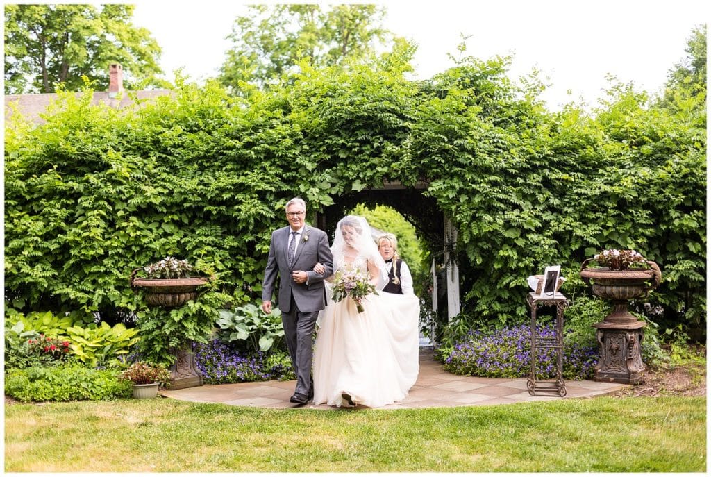 Bride and her father walking down the aisle at FEAST at Roundhill outdoor wedding ceremony