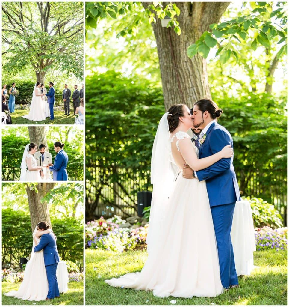 Bride and groom exchange rings and kiss during outdoor wedding ceremony at FEAST at Roundhill