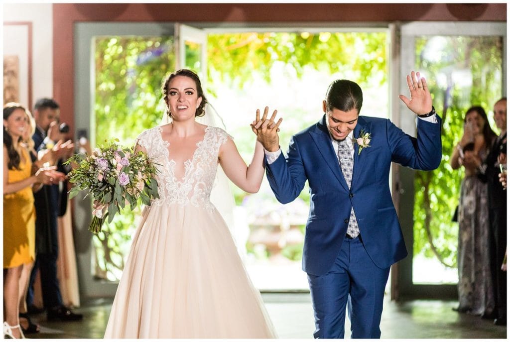 Bride and groom introduction at FEAST at Roundhill wedding reception