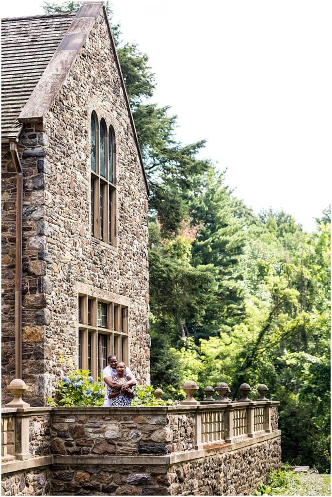 Hug from behind portrait at Hunting Hill Mansion at Ridley Creek State Park engagement session