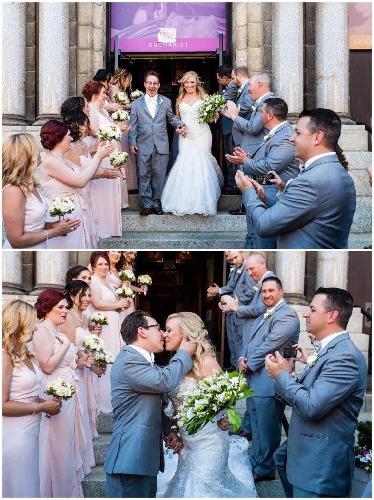 Traditional church wedding exit portrait, bride and groom kiss leaving church