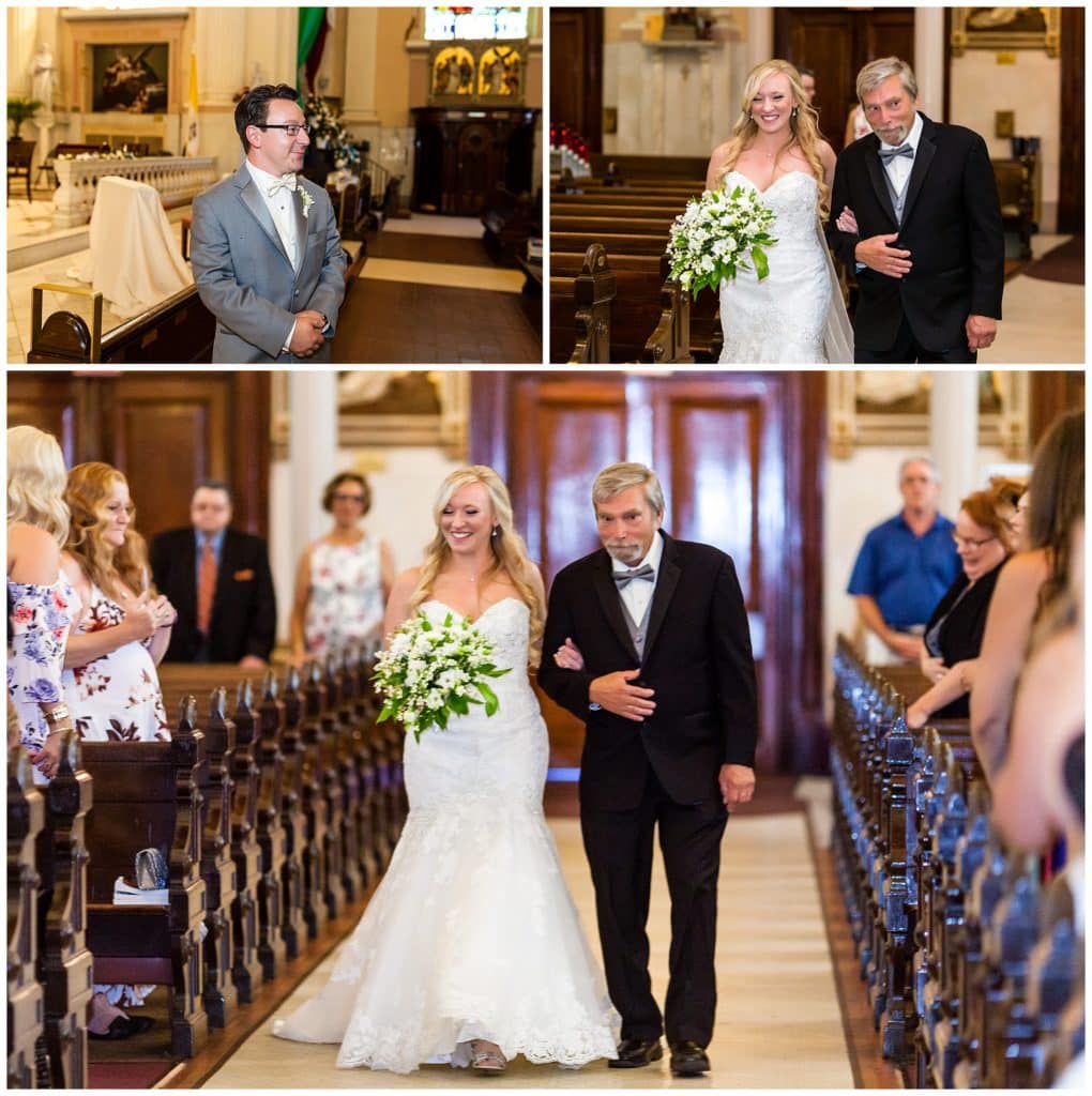 Groom watches as bride and father walk down the aisle of St. Thomas Aquinas Church wedding ceremony