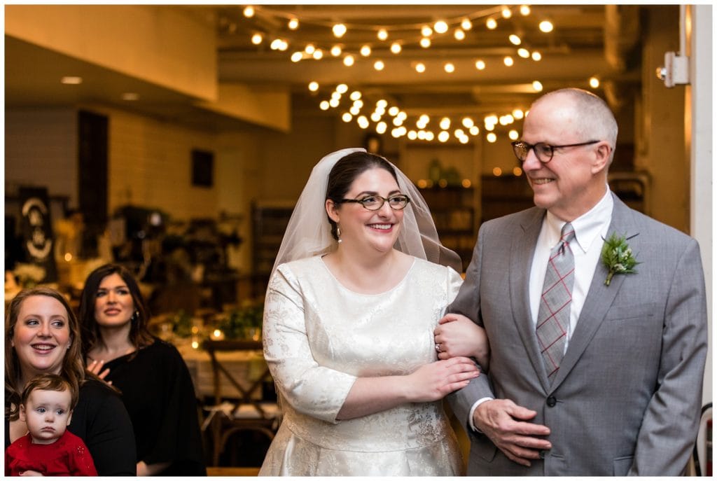 Bride and her father walk down aisle at Malvern Buttery intimate wedding