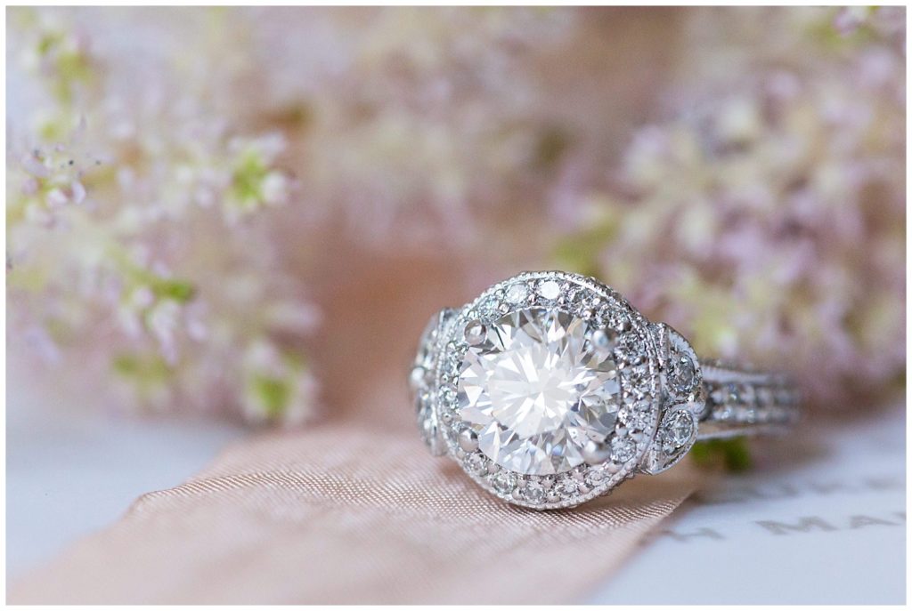 Elegant round engagement ring with pink florals