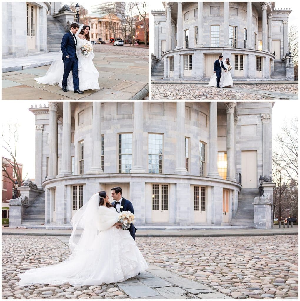 Bride and groom walk down paths and groom dips bride at sunset at Merchant Exchange Building