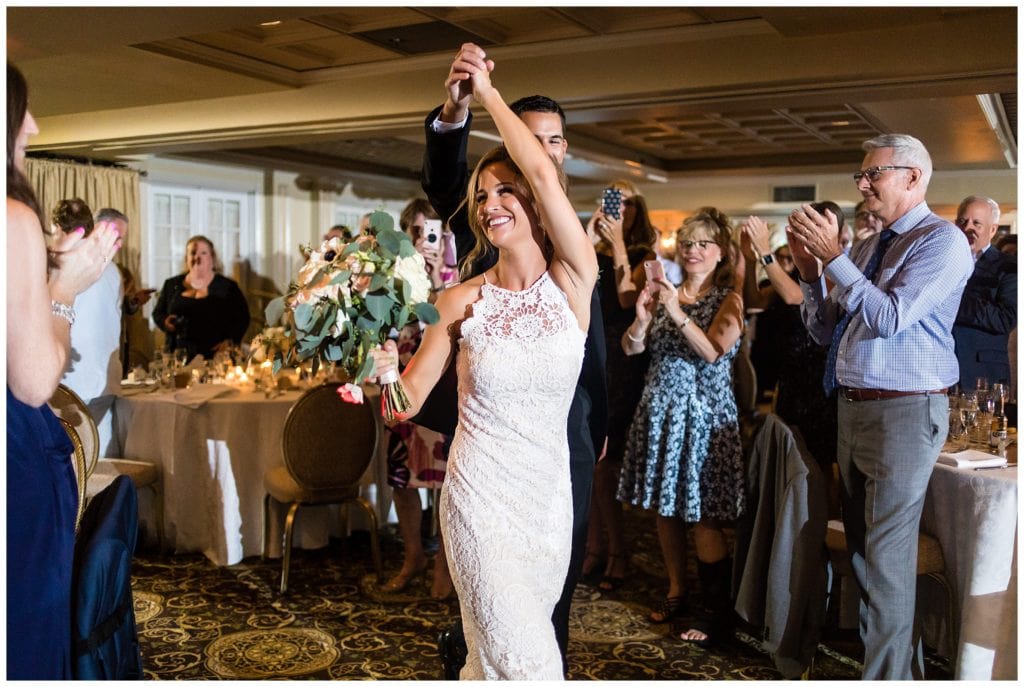 Bride and groom spin in their introduction at the Olde Mill Inn wedding reception