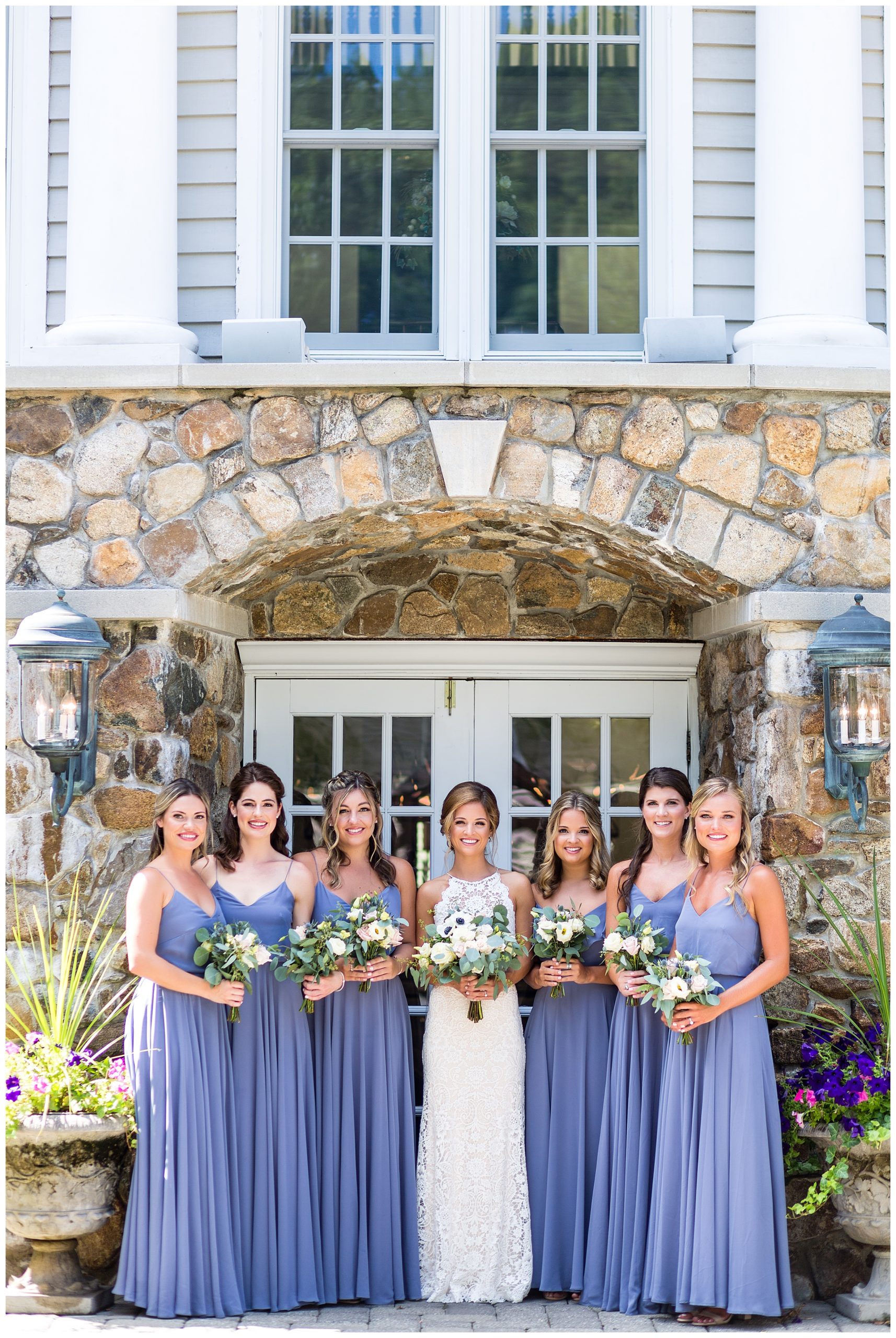 Traditional bridal party portrait with pale blue bridesmaids dresses