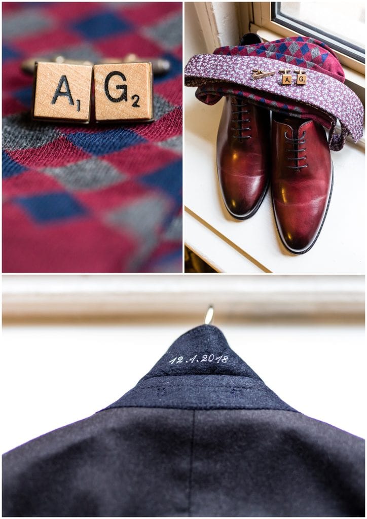 Groom wedding detail collage with Scrabble piece cufflinks, red tie and socks, and wedding date embossed on jacket