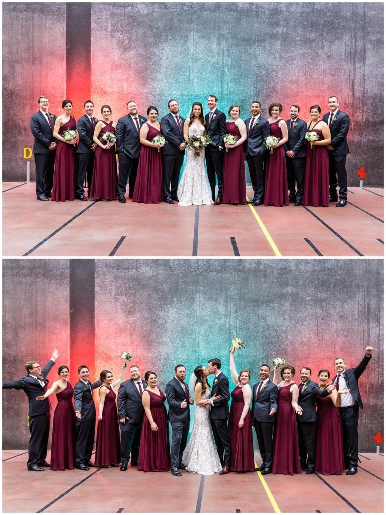 Wedding party backlit with red and green lights on court at Racquet Club of Philadelphia winter holiday wedding