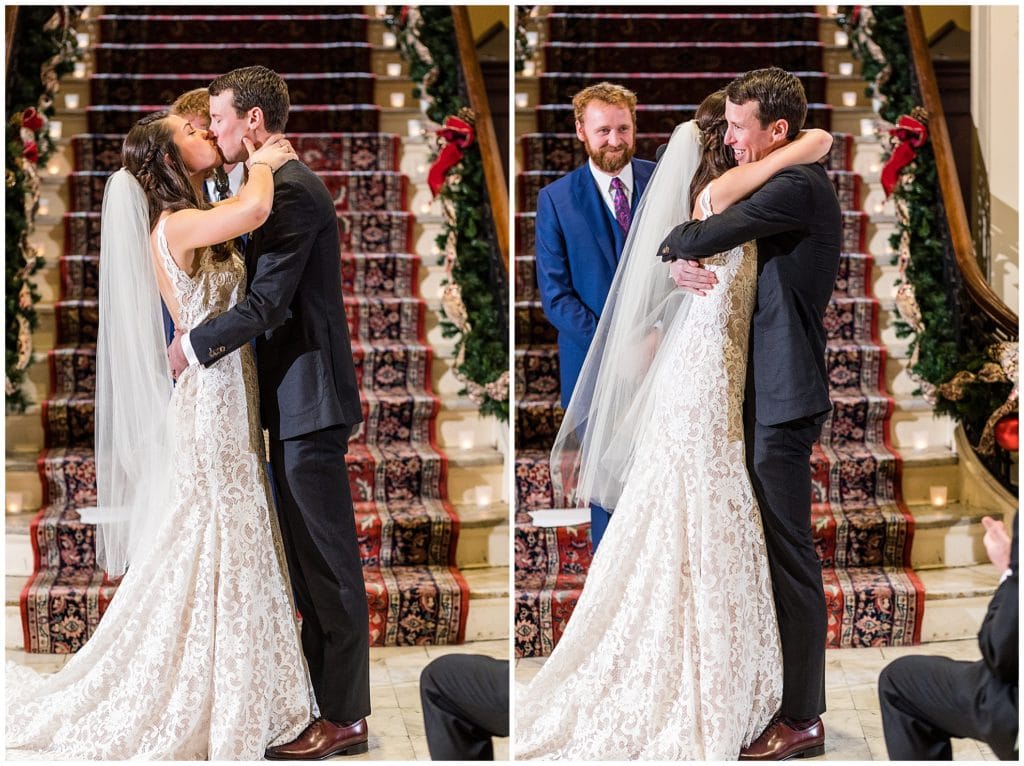 Bride and groom kiss and hug at Racquet Club of Philadelphia wedding ceremony