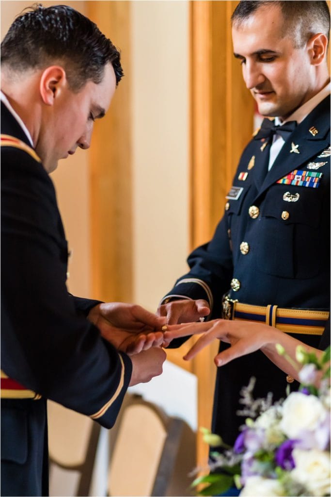 Best Man performing the ring exchange in traditional wedding ceremony at Holy Trinity Orthodox Church