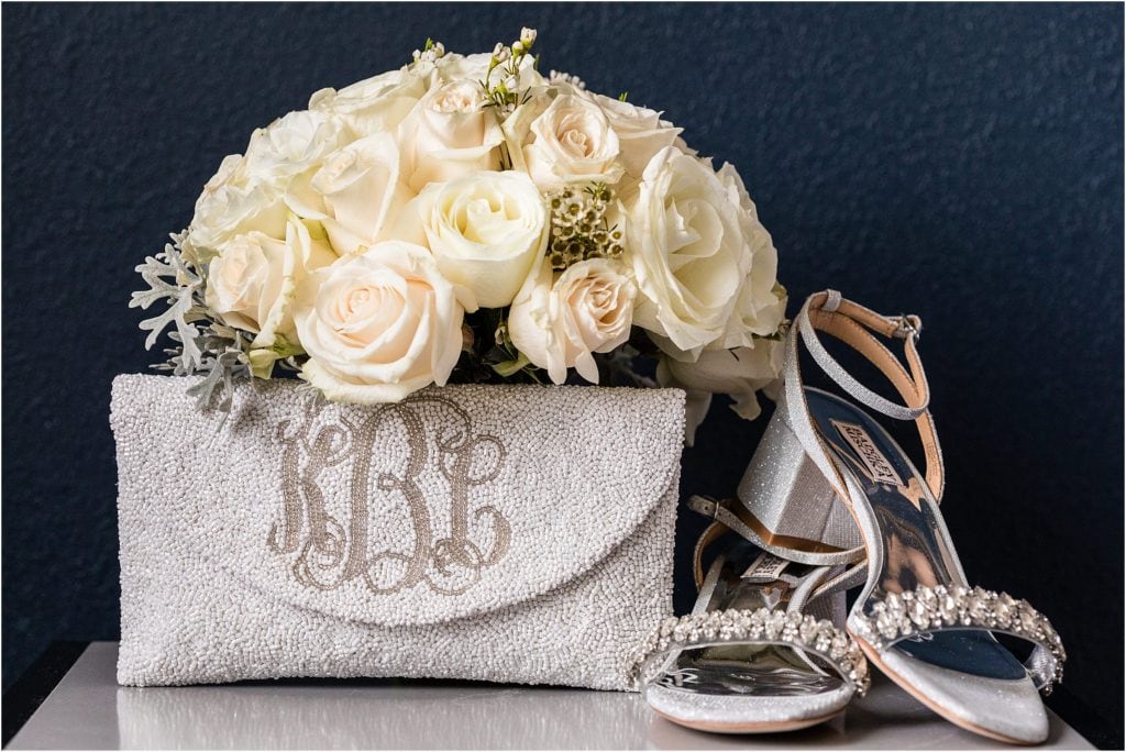 Bridal shoes and bridal bouquet and bridal purse