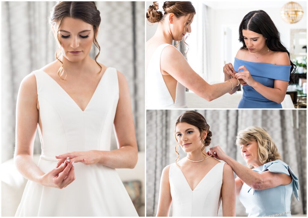 Bride gets help putting on her bracelet and necklace from family members