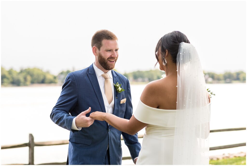 Groom sees his bride during first look together