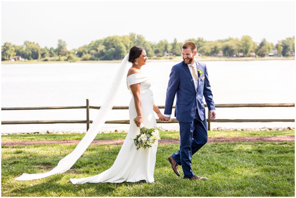 Couple walks together slowly, holding hands
