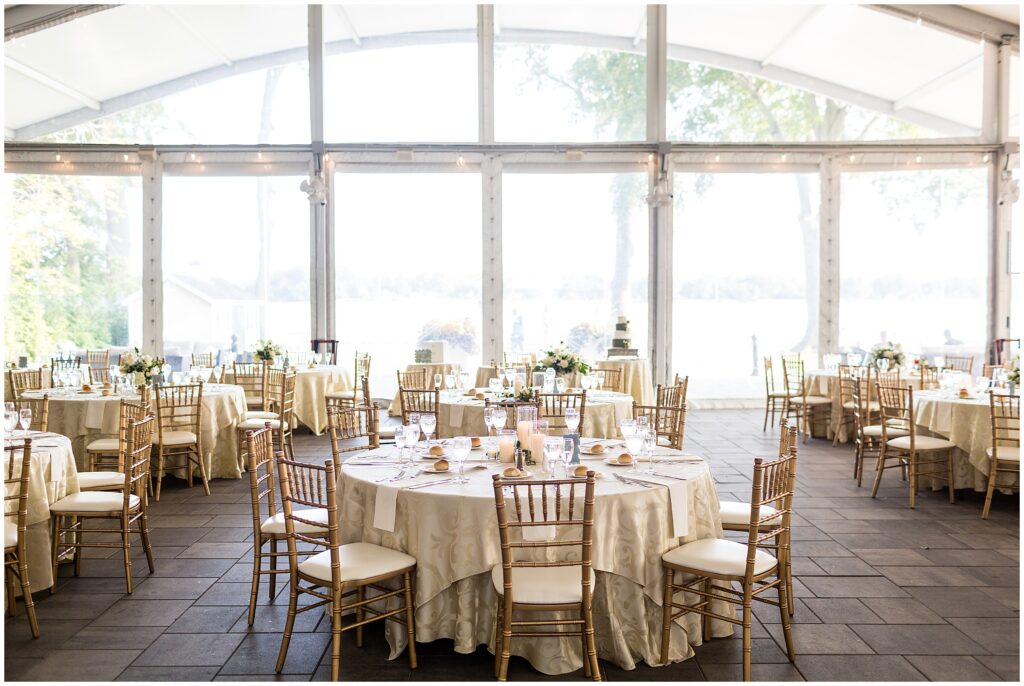 Pen Ryn Estate wedding reception with round tables with champagne tablecloths and gold chairs