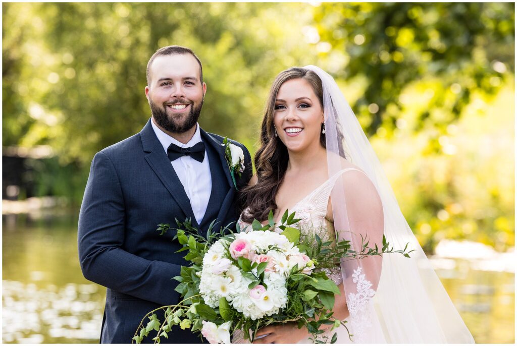 Couple smiles on their wedding day