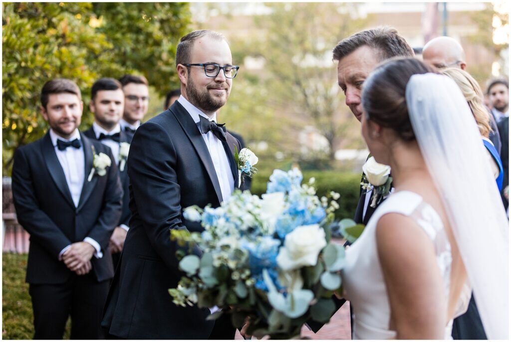 Bride and her father meet Groom at altar