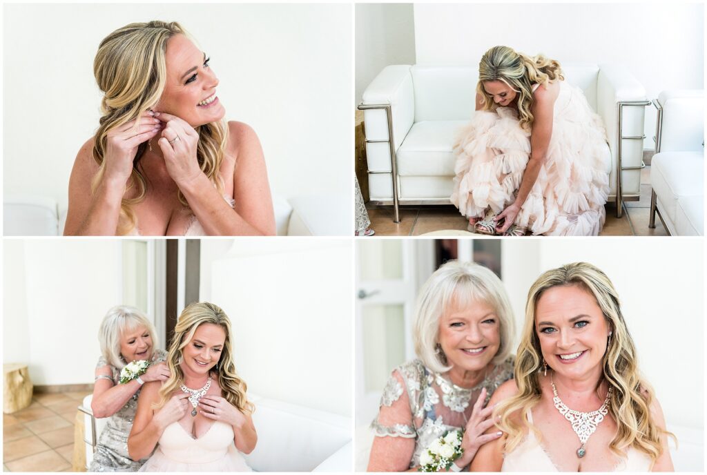 Bride puts in her earrings, adjusts her shoes, and has help adjusting her necklace from her mom