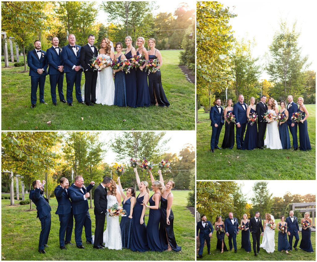 Newlyweds with their wedding party in shades of navy and colorful bouquets