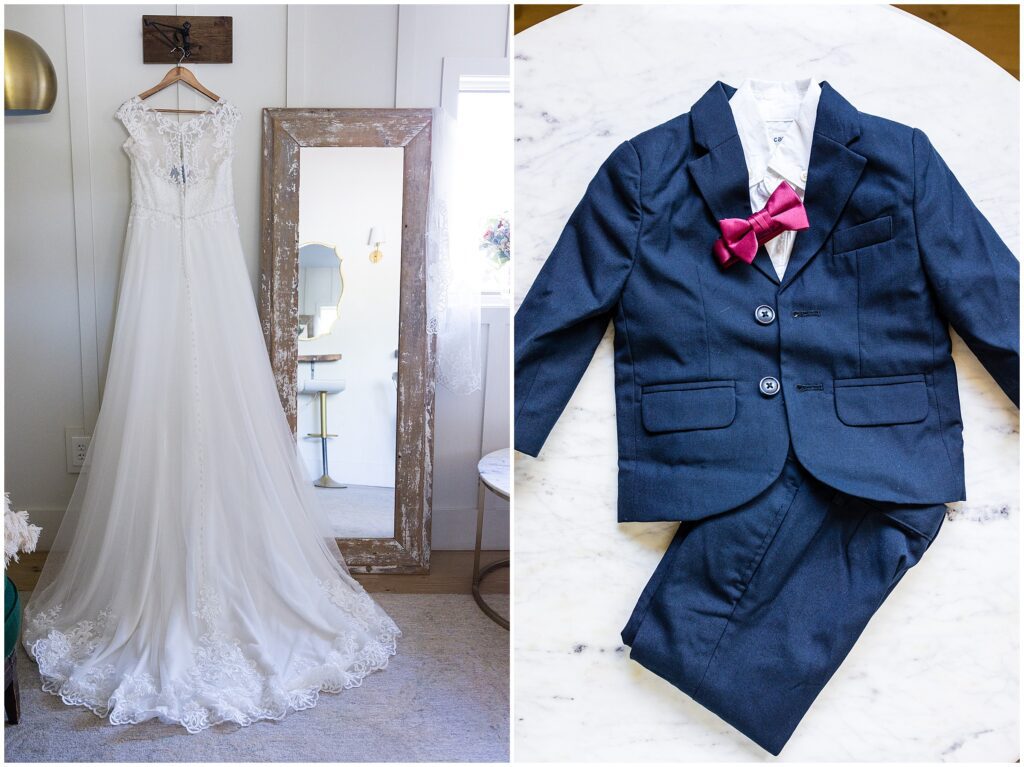 wedding dress with lace details, and kid's navy blue suit with bowtie 