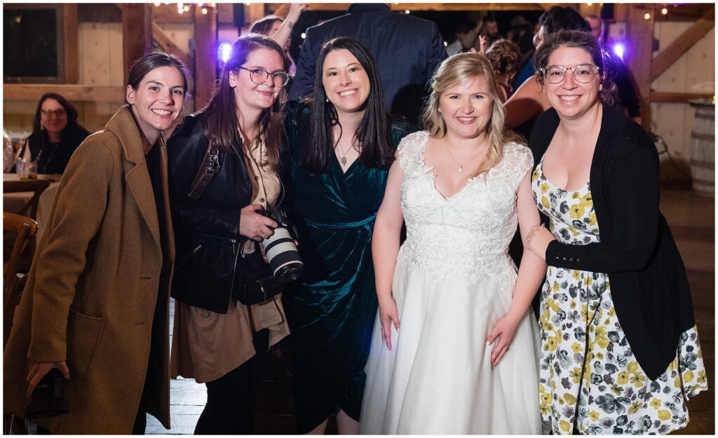 The Ashley Gerrity Photography Team with one of their own, the bride, on her wedding day