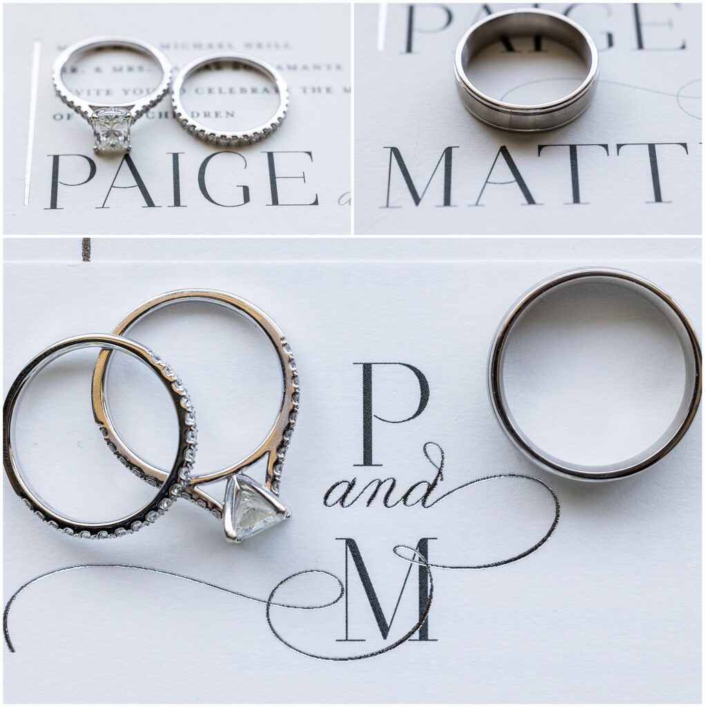 wedding rings on top of wedding invitations
