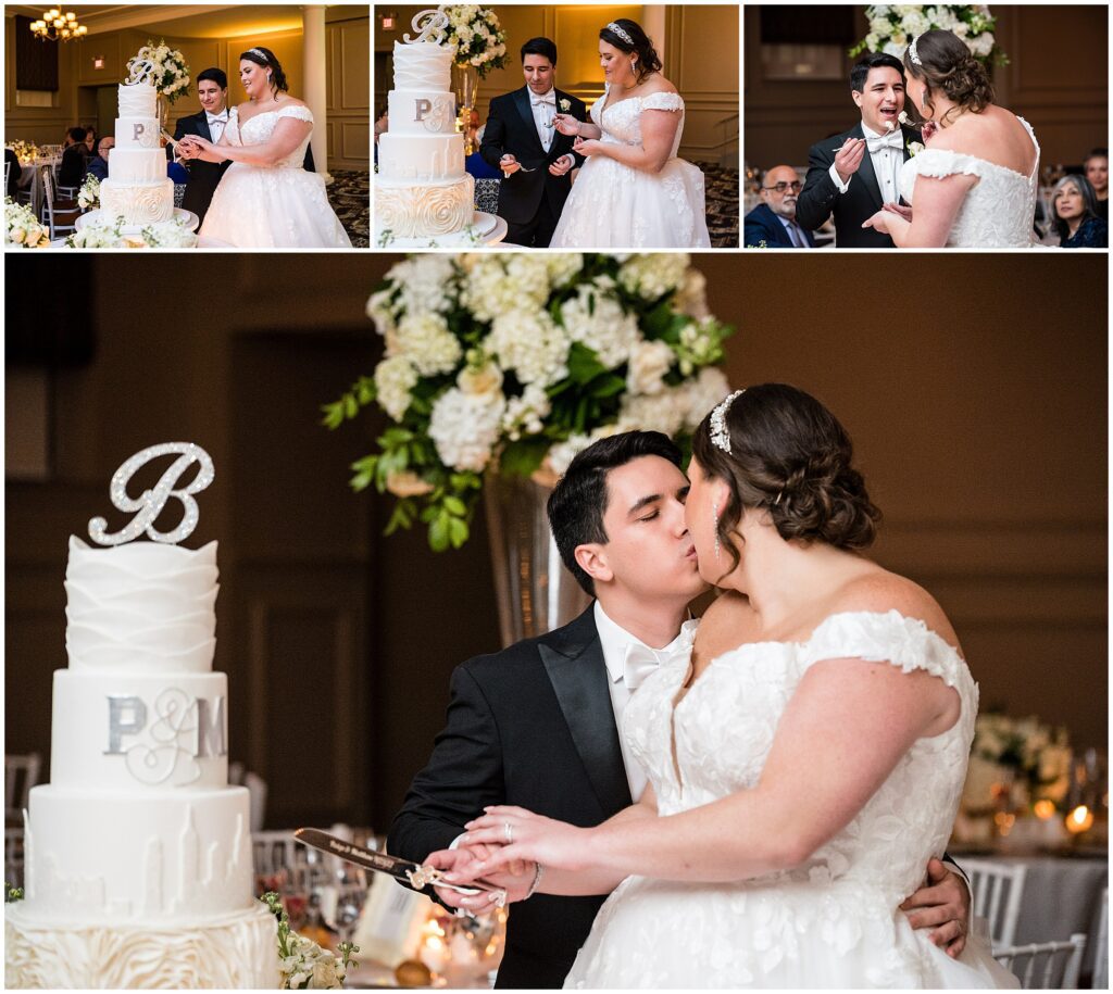 Couple cuts their white tiered wedding cake and shared a kiss at their wedding reception 