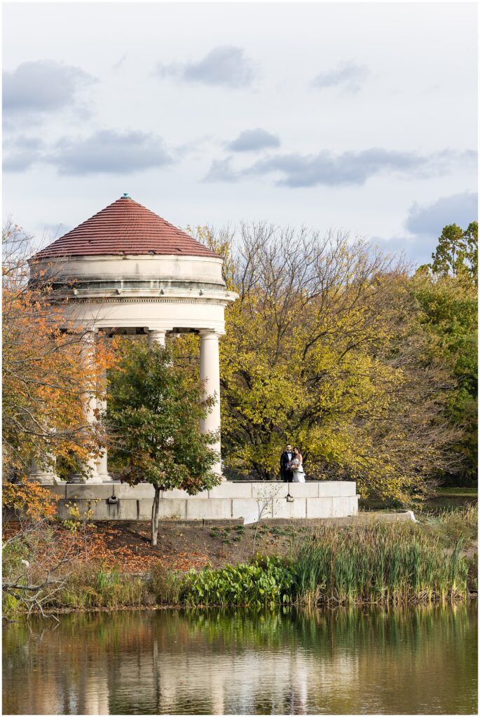 Bride and Groom wedding day portraits at pavilion in FDR Park
