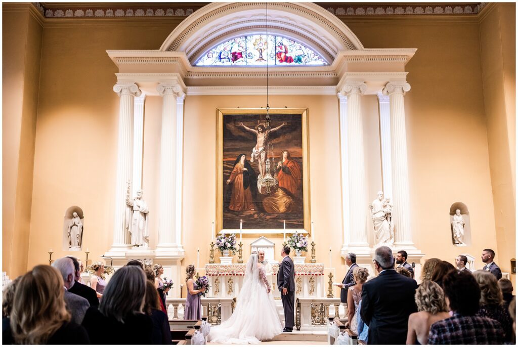 Bride and Groom at the altar at Old St. Joe’s