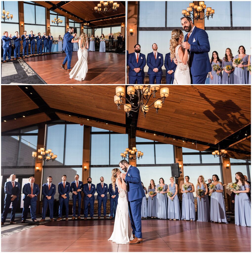 First dance surrounded by wedding party in the ballroom with wooden-slatted ceilings at Blue Mountain Ski Resort