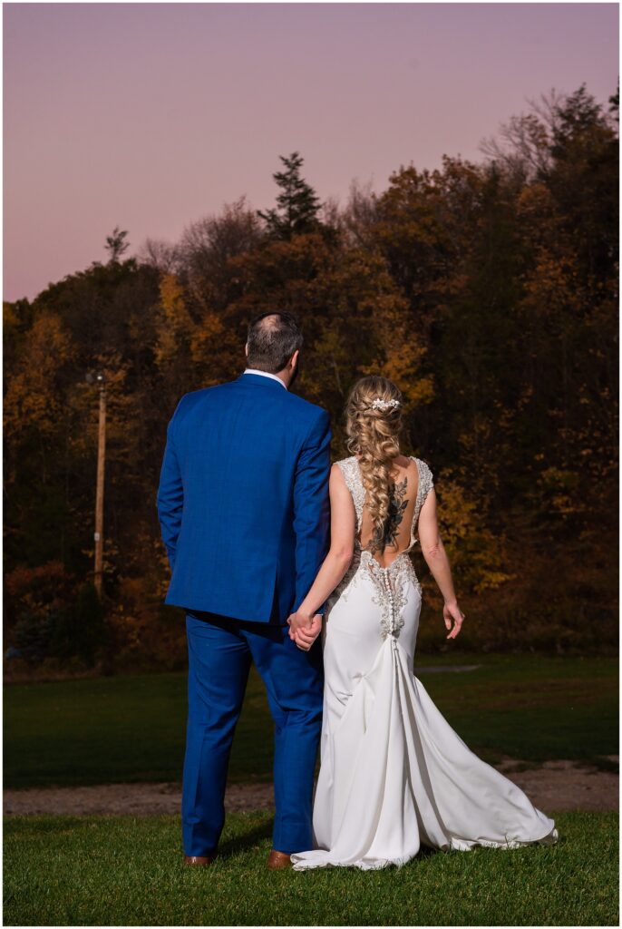 sunset portrait of newlyweds at the scenic overlook at Blue Mountain Ski Resort
