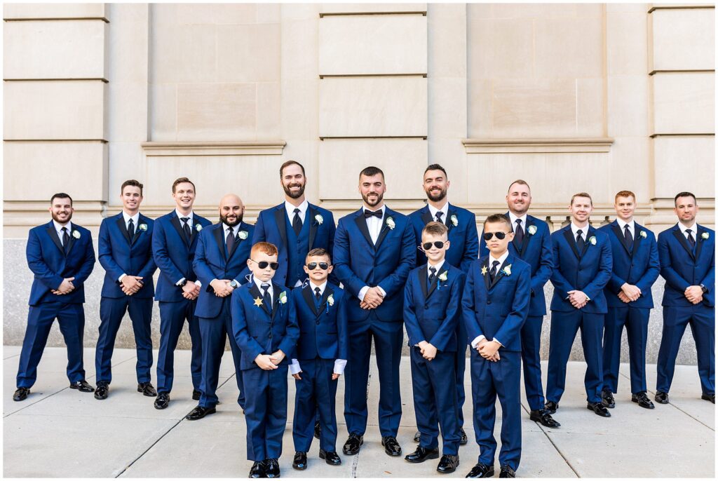 Groom and his wedding party in navy suits