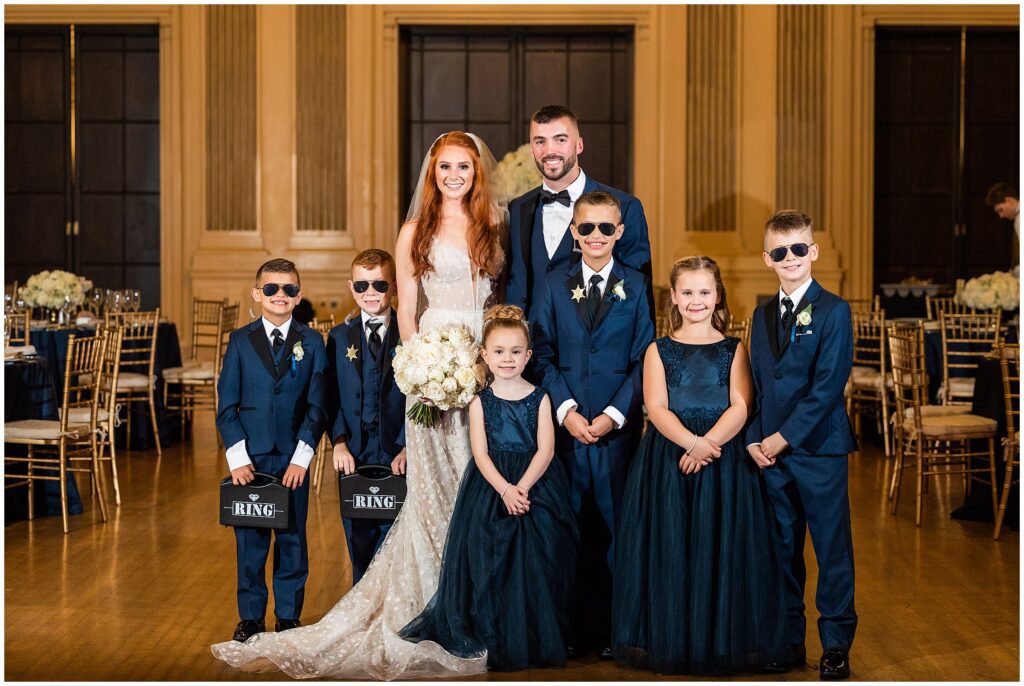 Bride and Groom with their junior attendants before a fall wedding at Hotel DuPont