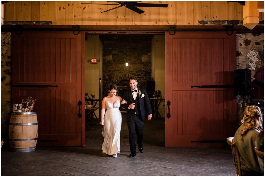 Newlyweds enter Grace Winery barn wedding reception