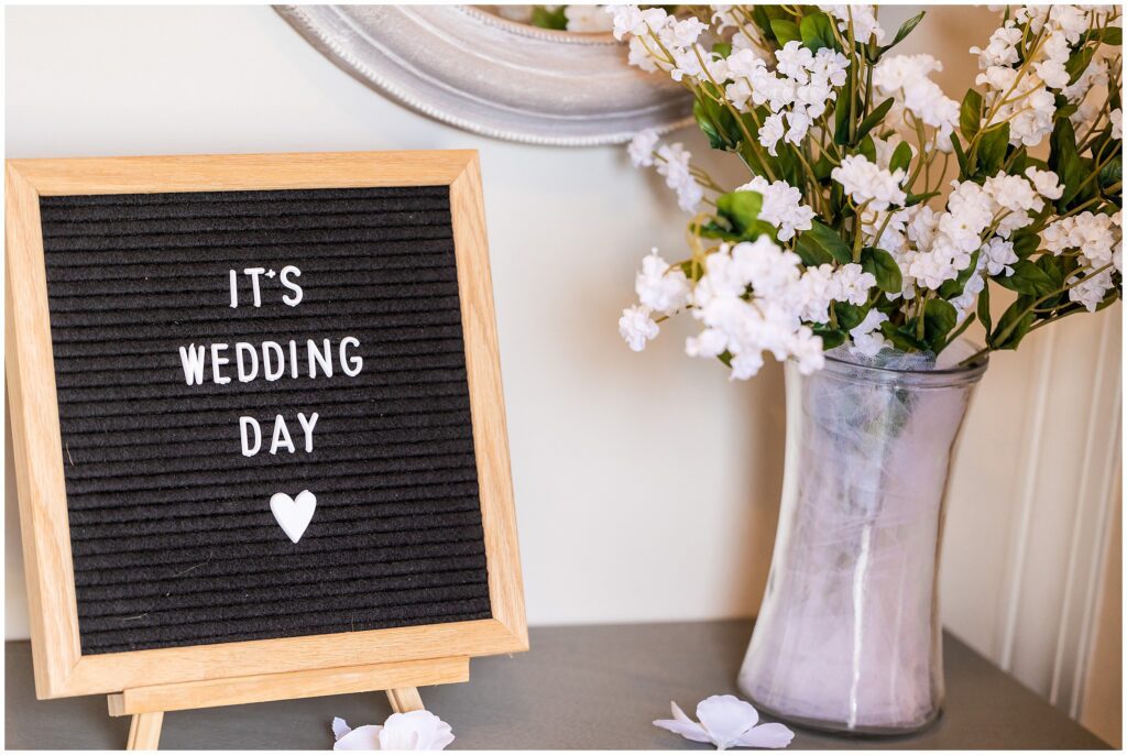 minimal letterboard sign that says "it's wedding day" for a getting ready moment