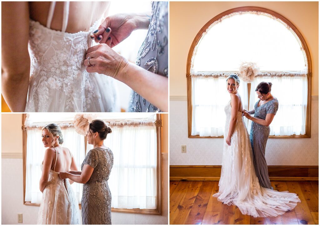 Bride's dress is zipped up before wedding