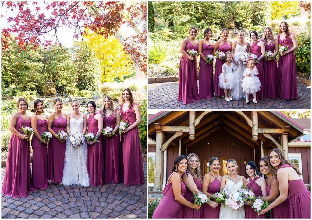 Wedding party in long deep rose dresses stands next to bride in white dress with embroidery details while all hold white and blush bouquets