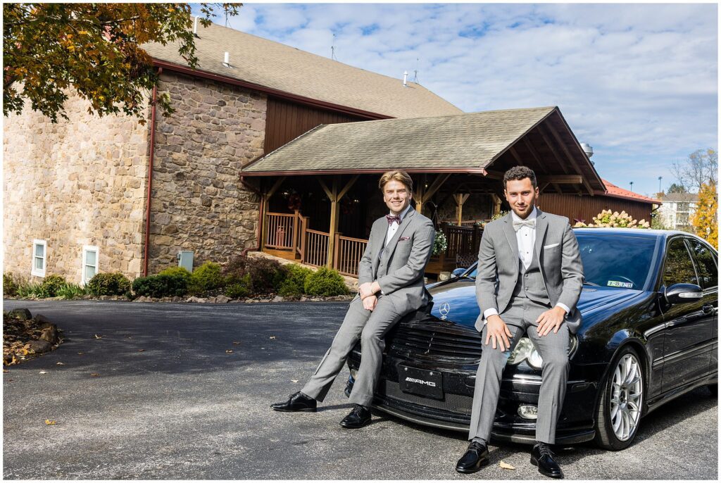 groom and groomsman with black Mercedes-Benz