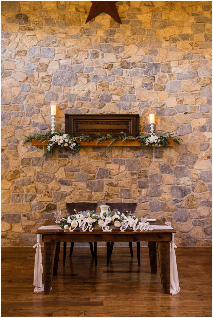 sweetheart table inside the barn ballroom at Meredith Manor