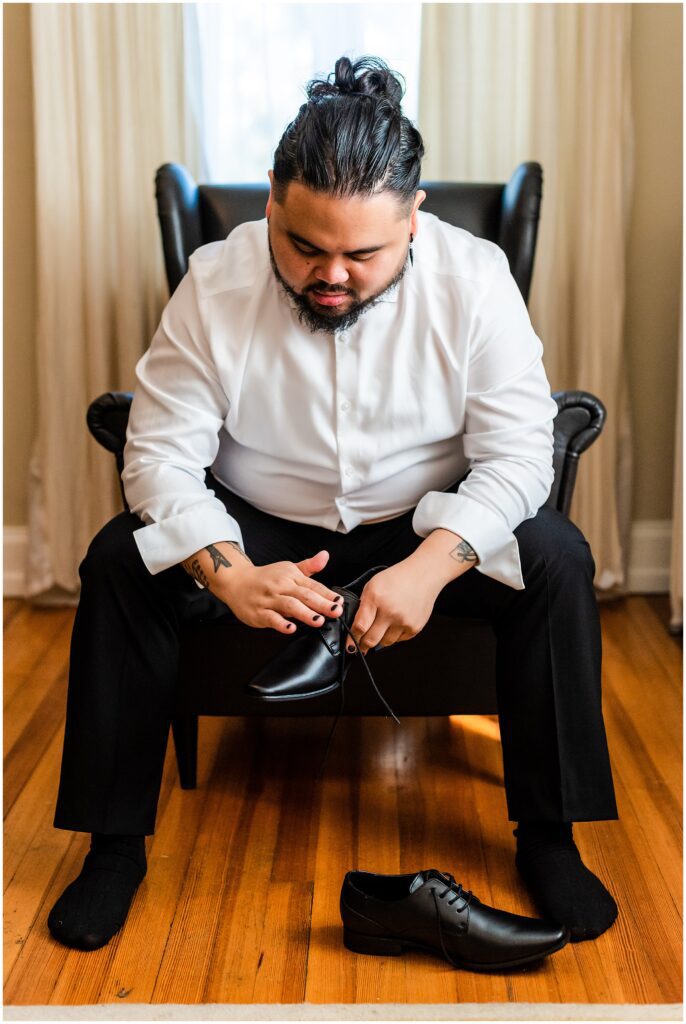 Groom gets ready for wedding
