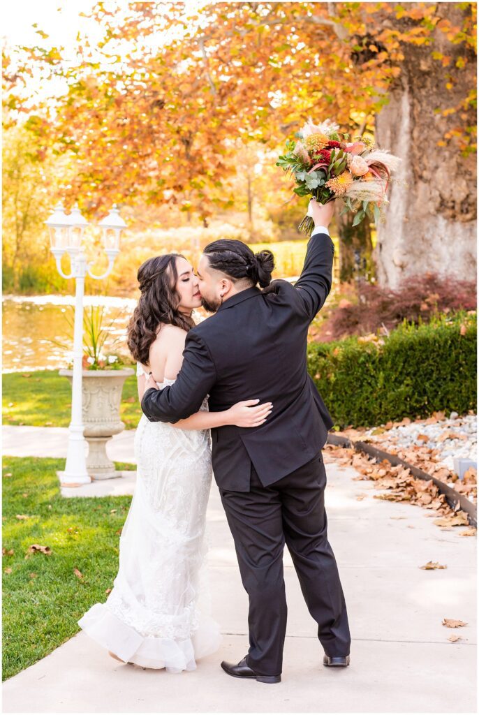 newlyweds kiss after their fall wedding at Prophecy Creek