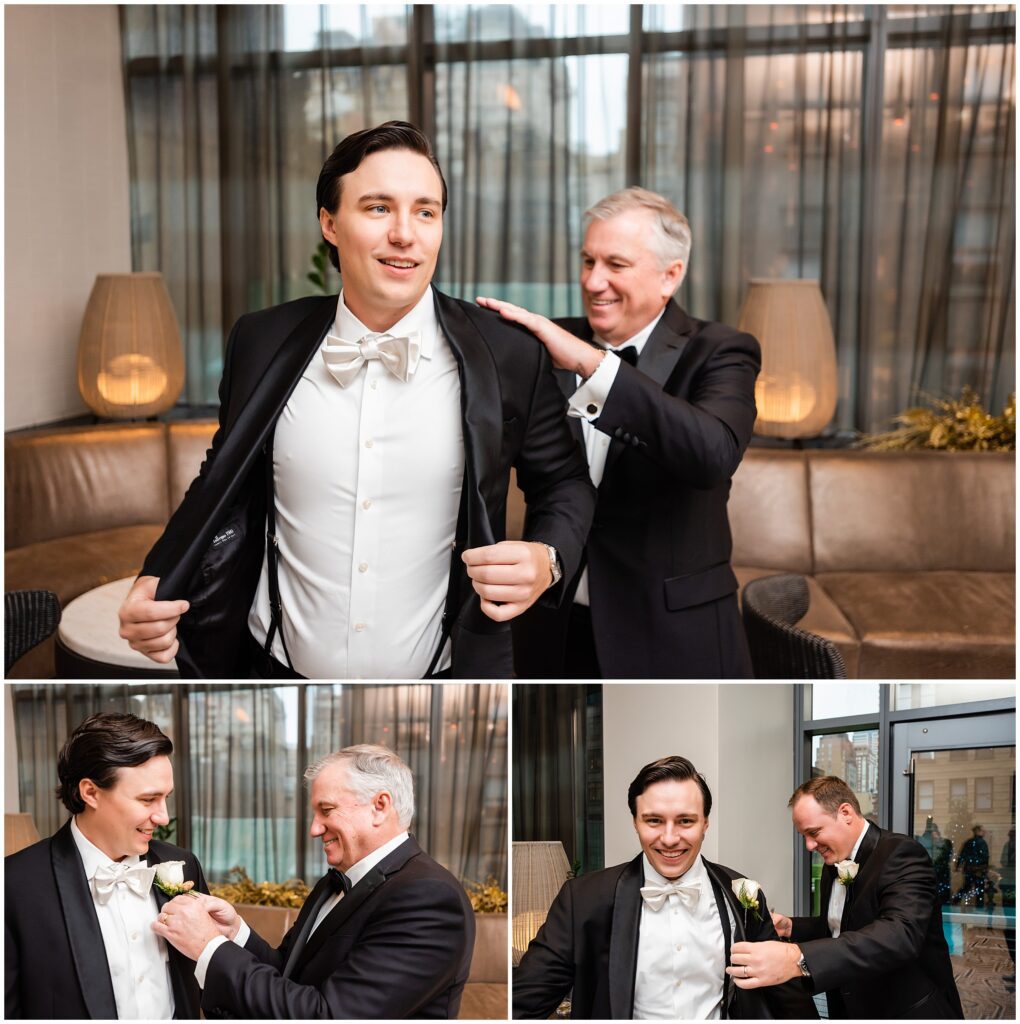 Groom has help with the finishing touches for his wedding attire