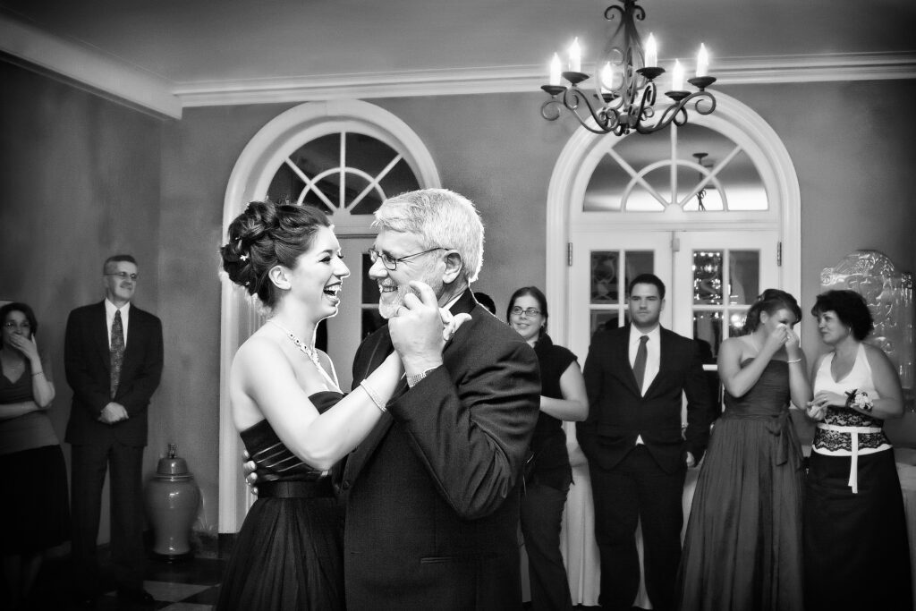 Wedding Photographer Ashley Gerrity dances with her dad to Ben Folds's song, Gracie.